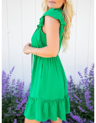 Green ruffled sleeve mini dress