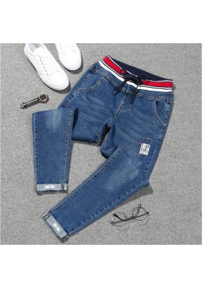 Stretch denim elastic patch cuff pencil jeans